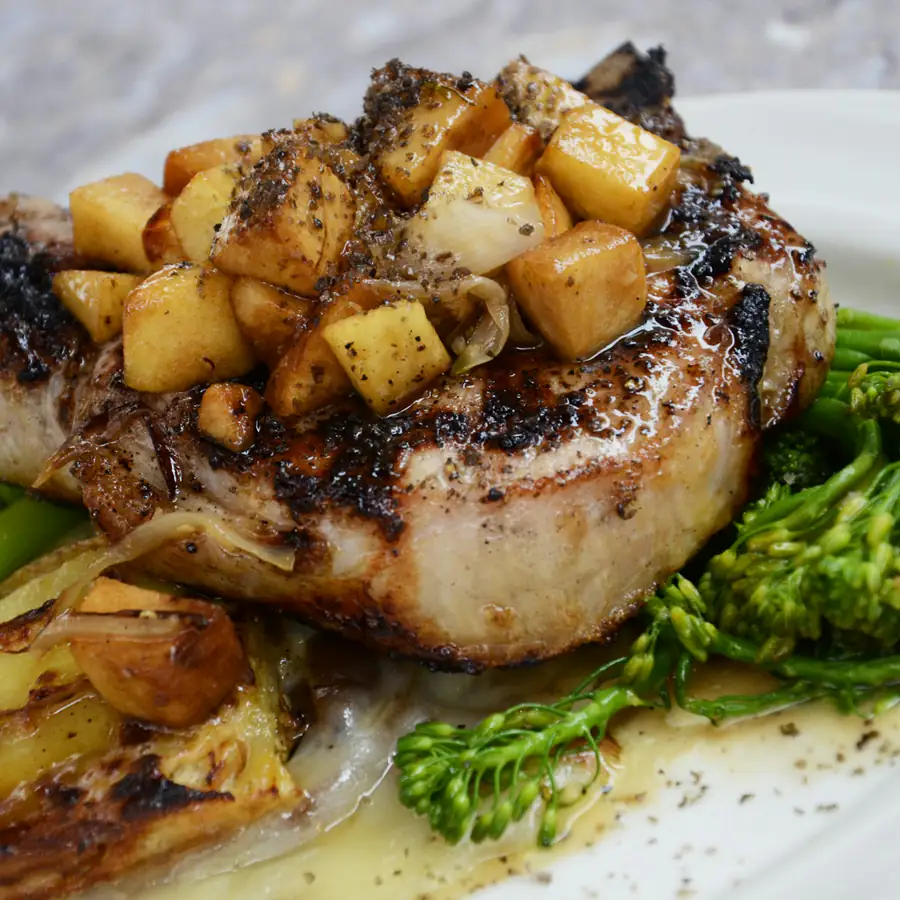 Pork chop topped with caramelised apple