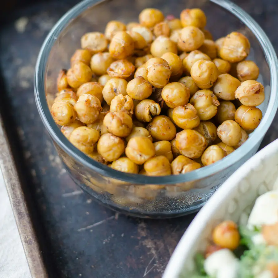 Glass bowl of salted roasted chickpeas