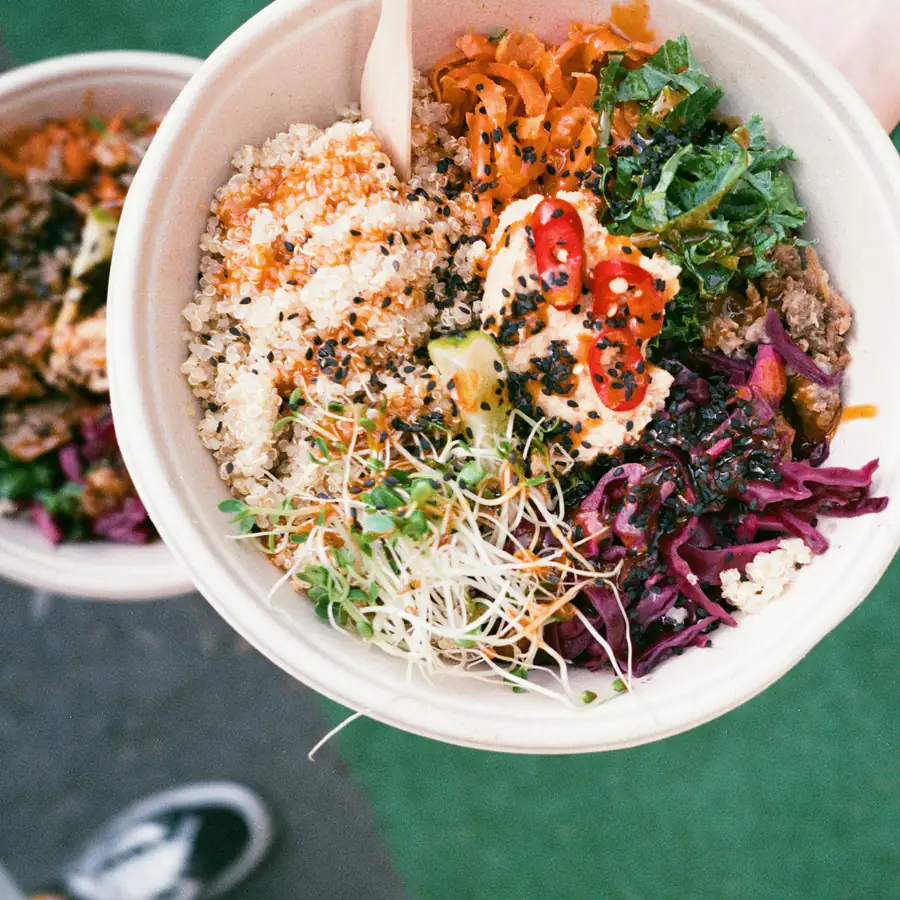 Bowl of spiced chicken with salad