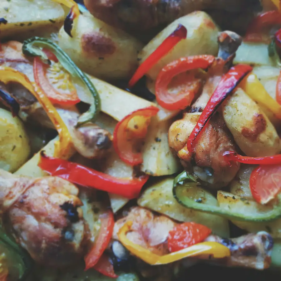 Roasted peppers, courgette and sausage on a tray