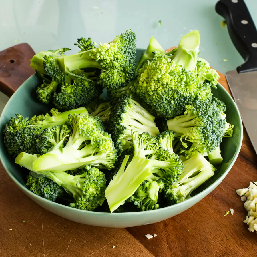 Bowl of roasted broccoli florets