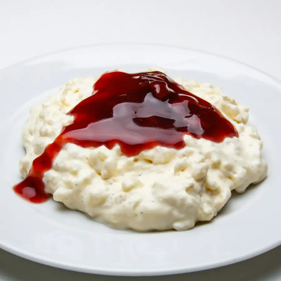 Creamy rice pudding topped with berry compote