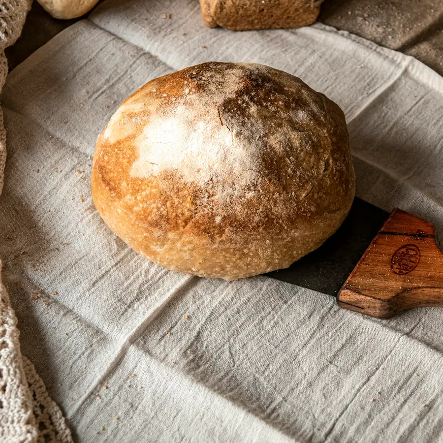 Round golden bread roll