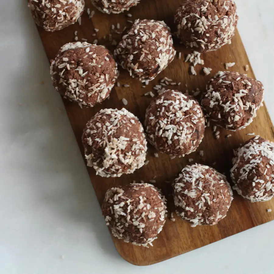 Chocolate energy balls rolled in coconut
