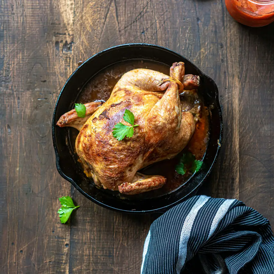 Roast spiced chicken in a pan