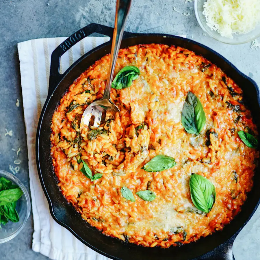 Skillet of creamy orzo with basil