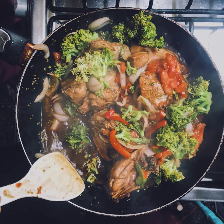 Wok of stir fried meat and vegetables