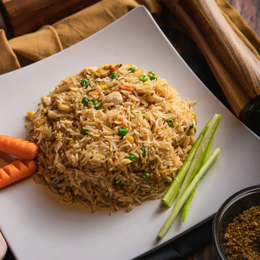 Plate of egg fried rice with vegetables