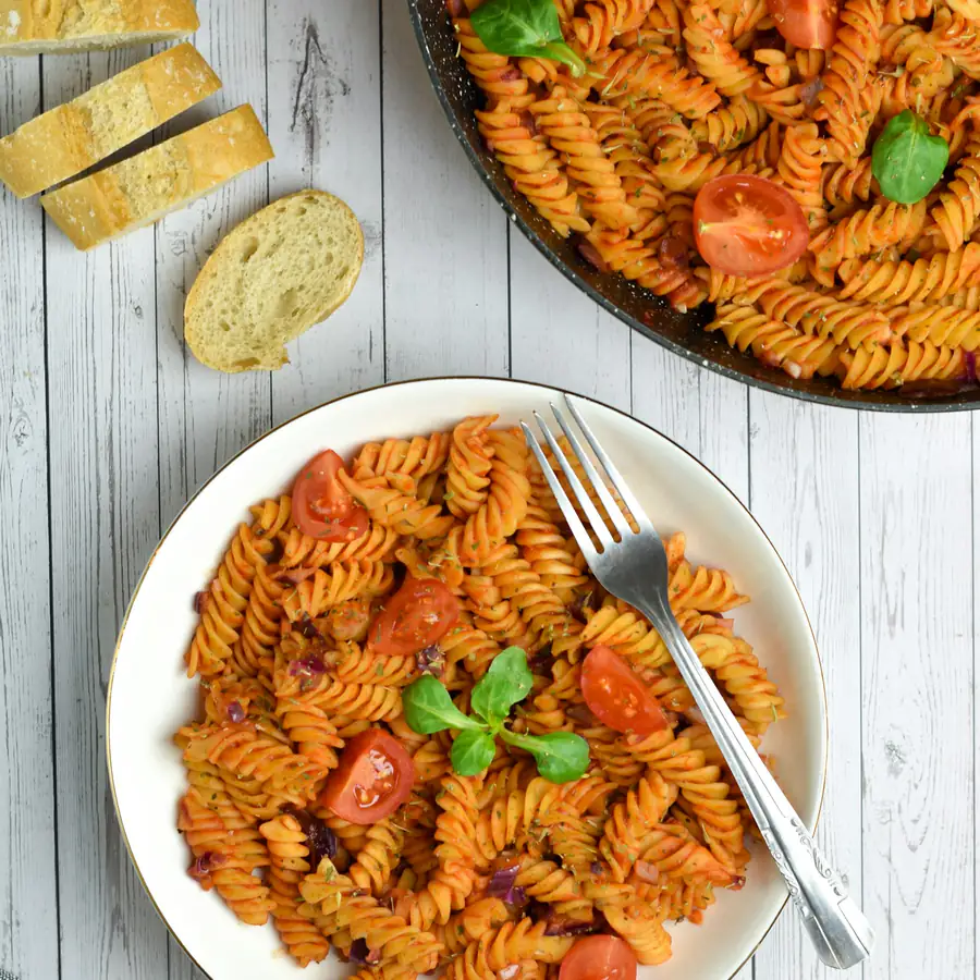 Plate of fusilli in a rich tomato sauce