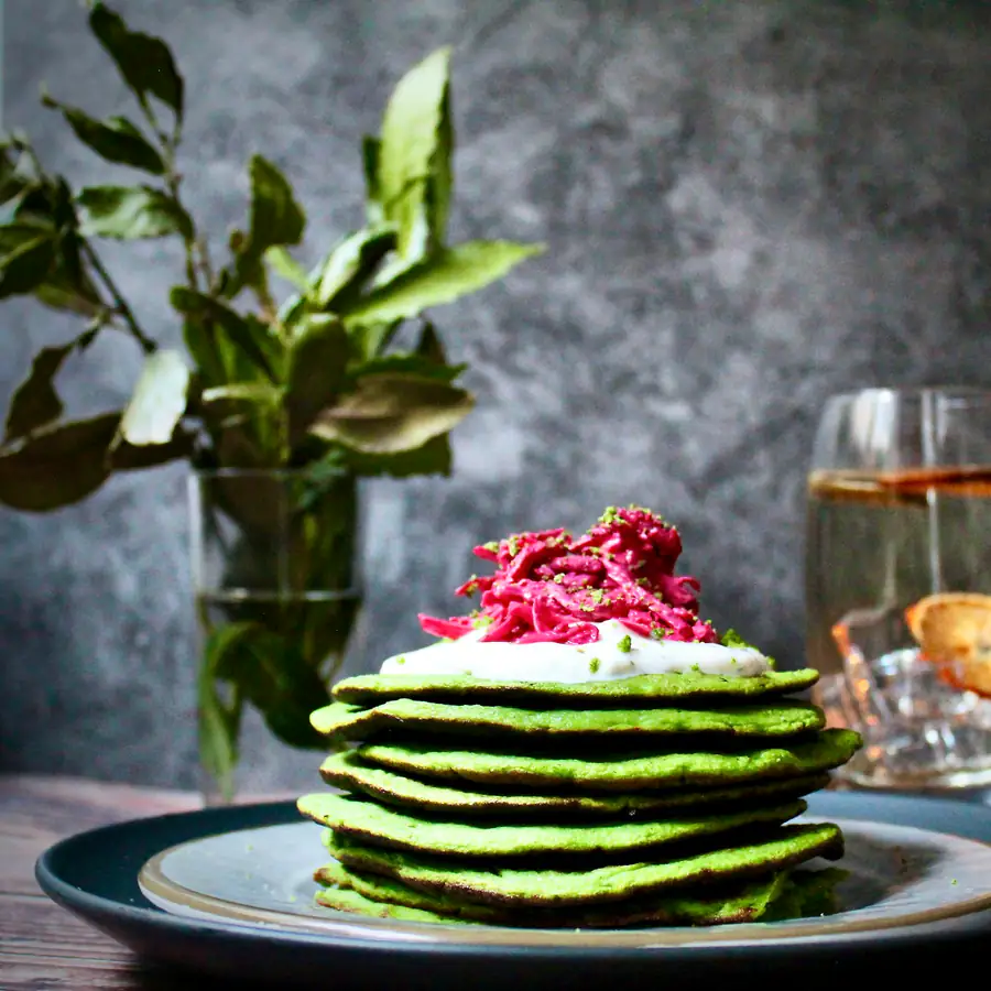 Stack of green spinach pancakes