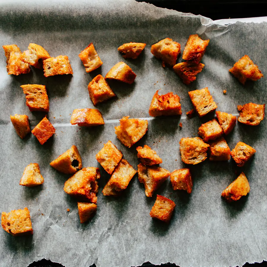 Crisp roasted bite-size pieces on a lined baking tray