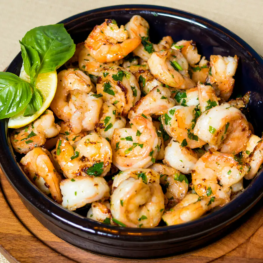 Skillet of garlic butter prawns