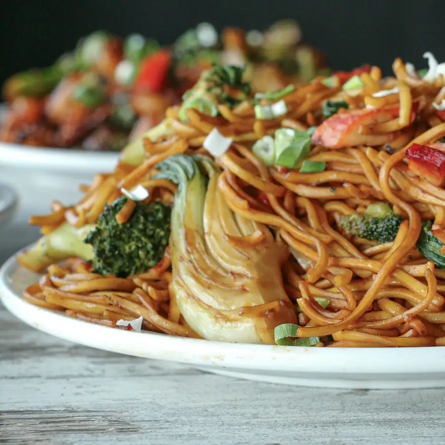 Plate of chow mein noodles with vegetables