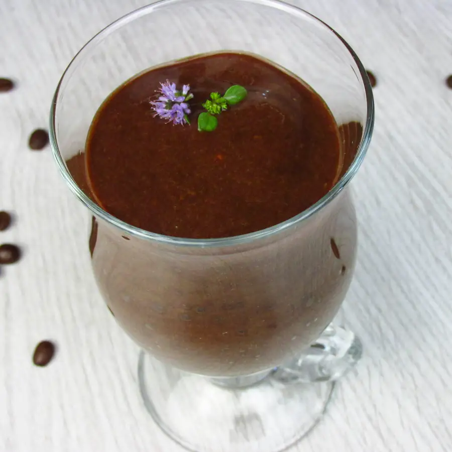 Glass of thick chocolate smoothie