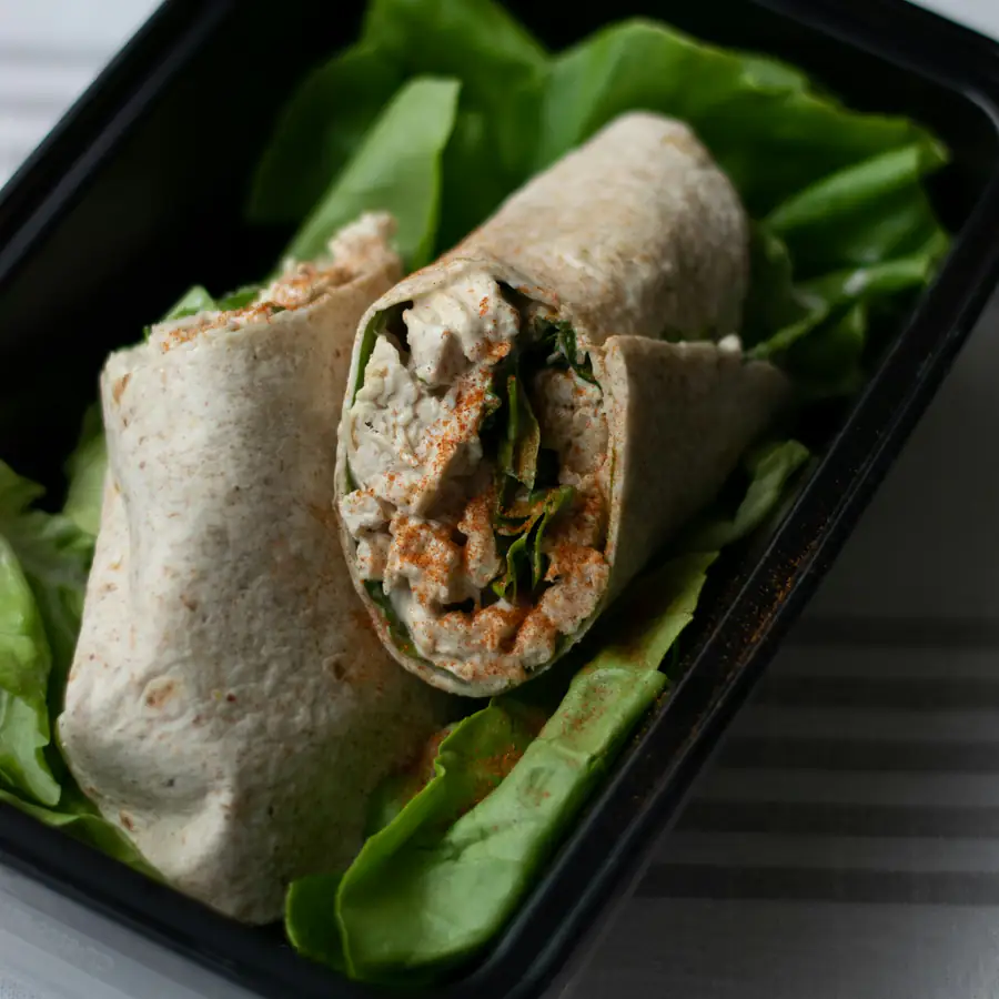Chicken and lettuce wrap cut in half
