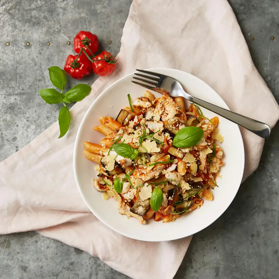 Bowl of orzo in a tomato sauce