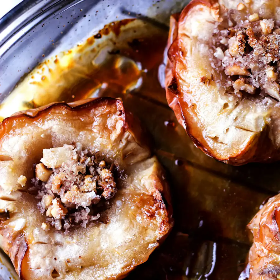 Baked pear halves filled with a spiced crumble in a tin
