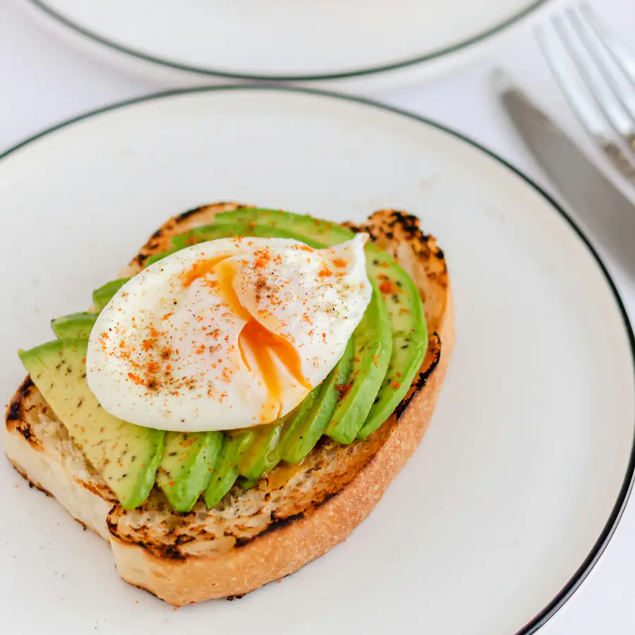 Avocado toast with a soft egg
