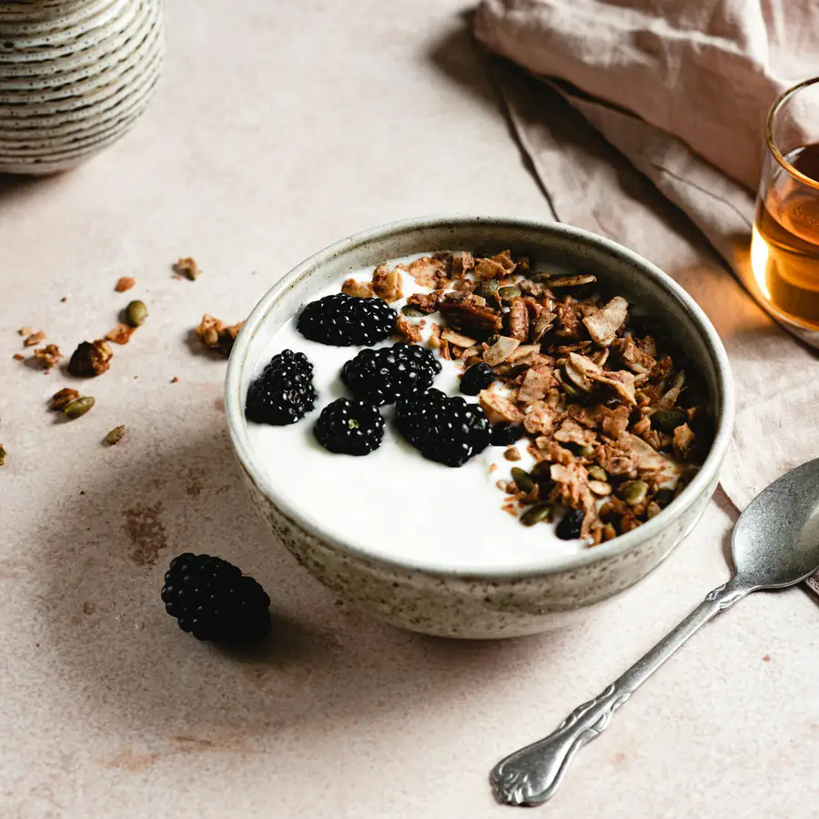 Bowl of yoghurt with berries and granola