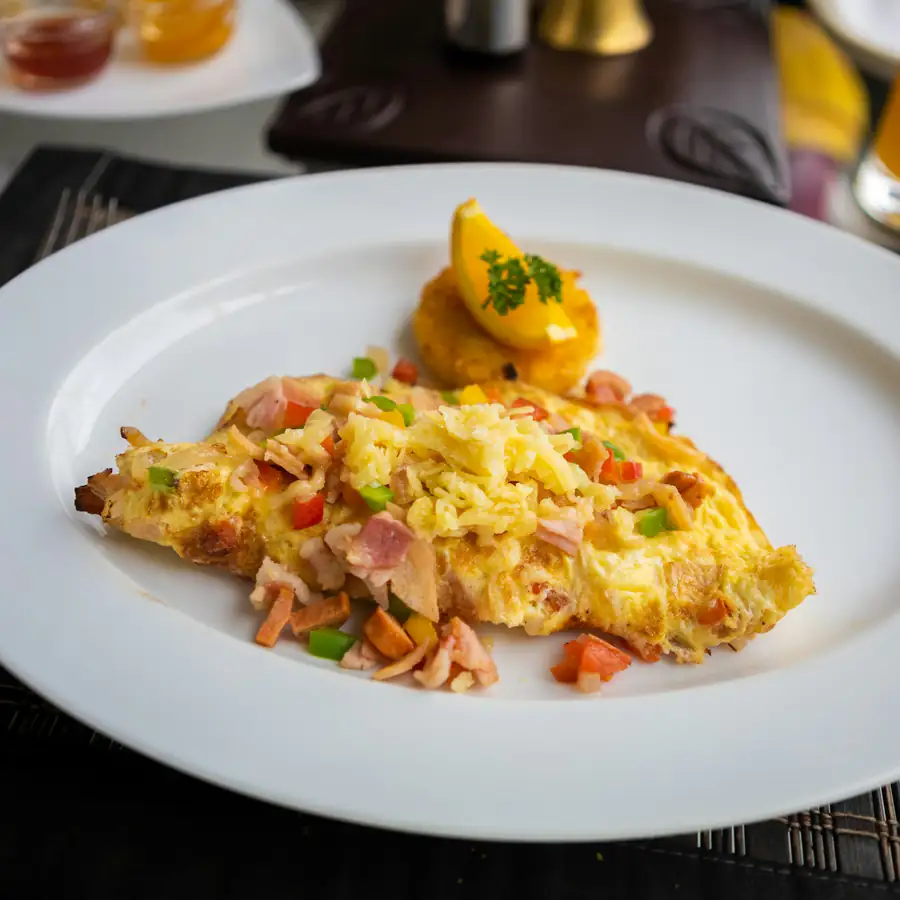 Folded vegetable omelette on a plate
