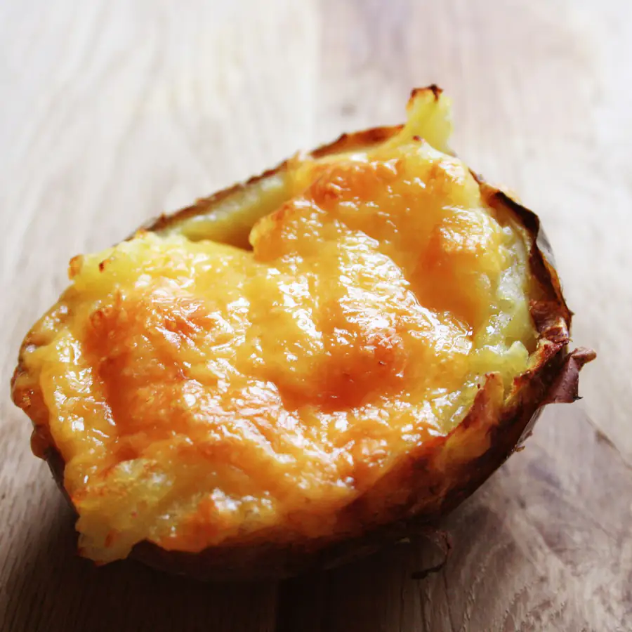 Baked jacket potato with melted cheese