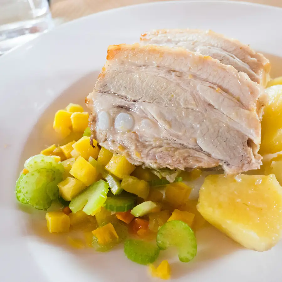 Slow-cooked pork with potatoes and vegetables