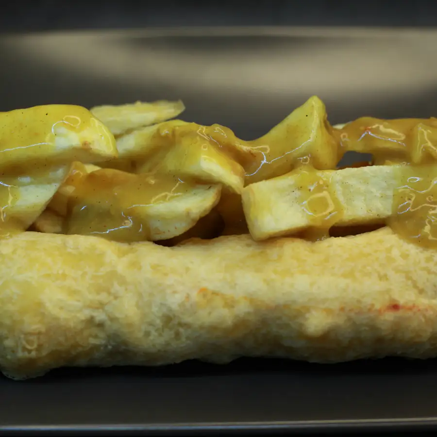 Chips with a pot of curry sauce